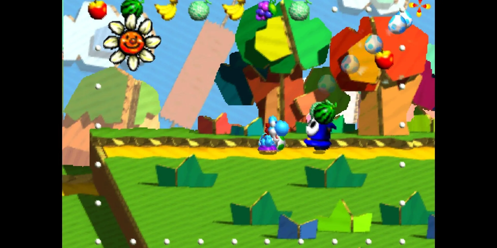 Ảnh chụp màn hình Yoshi trong game Yoshi's Story đang ném trứng