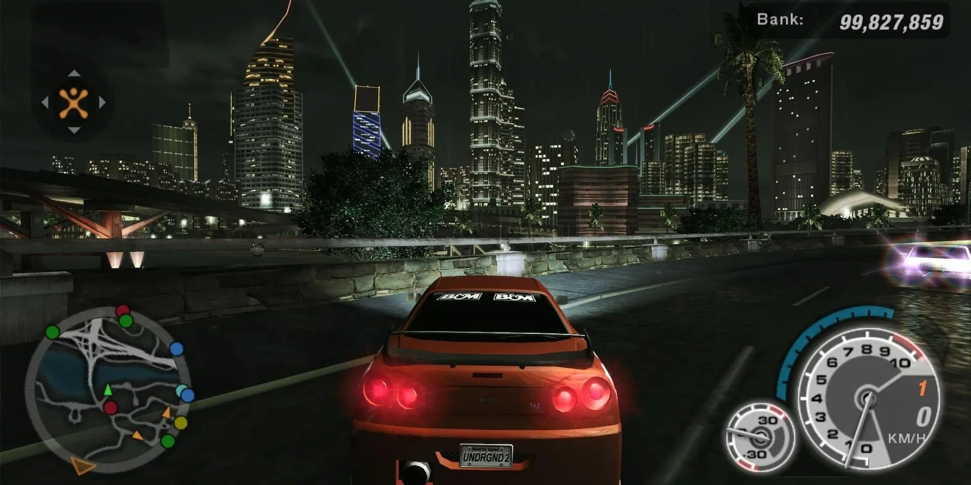 Cảnh đua xe đêm trong Need For Speed Underground 2 với xe Nissan Skyline, tựa game đỉnh cao trên PS2