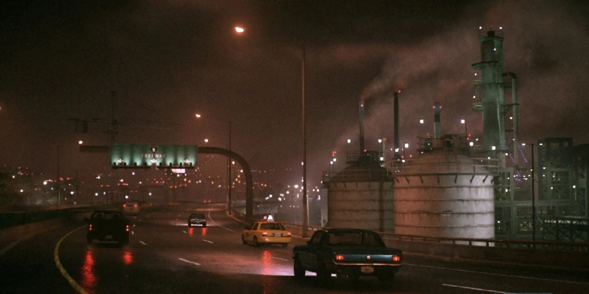 Đường phố Ventura Bay về đêm trong Need for Speed 2015 với hiệu ứng ánh sáng neon