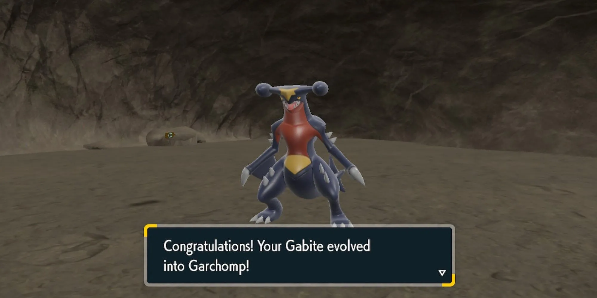 Hình ảnh Gabite tiến hóa thành Garchomp trong Pokémon Scarlet and Violet DLC, minh họa cho việc sưu tầm và phát triển Pokémon
