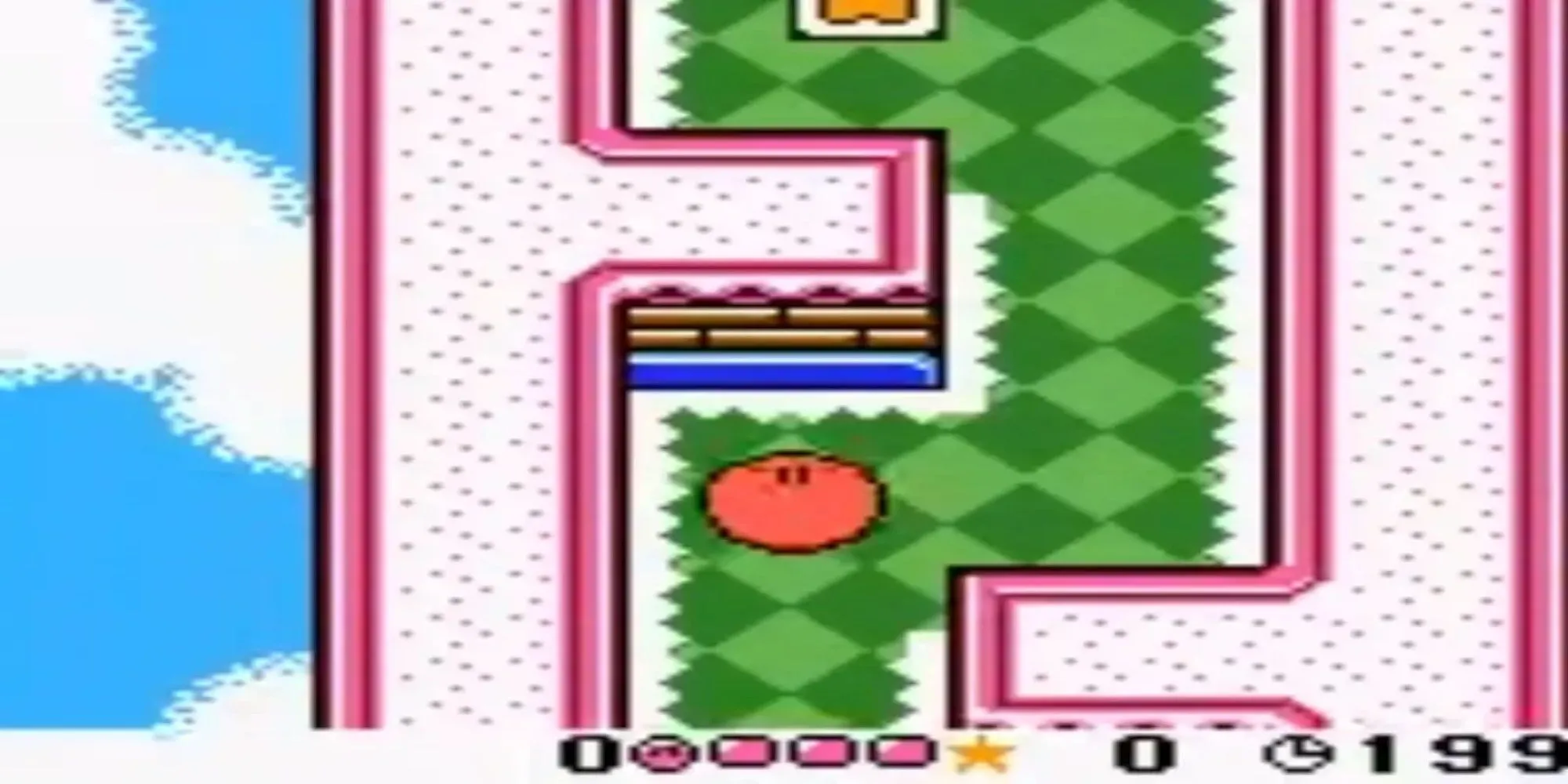 Hình ảnh Kirby cuộn tròn trong game Kirby Tilt 'n' Tumble trên Game Boy Color với giao diện hiển thị