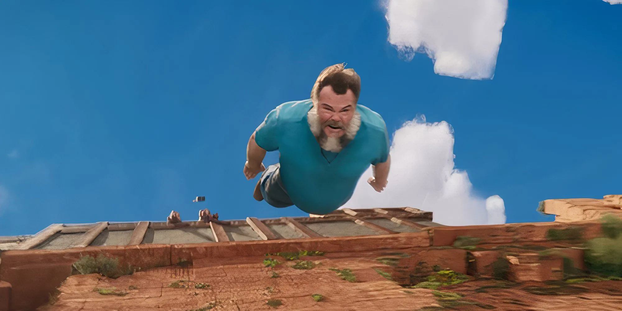 Jack Black vai Steve ngã trong một cảnh phim A Minecraft Movie