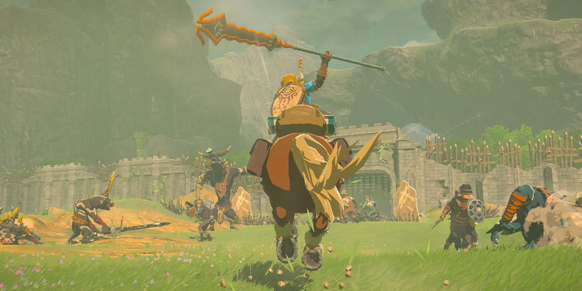Link cưỡi ngựa băng qua những cánh đồng rộng lớn của Hyrule trong The Legend of Zelda: Tears of the Kingdom, thể hiện quy mô khám phá của trò chơi.