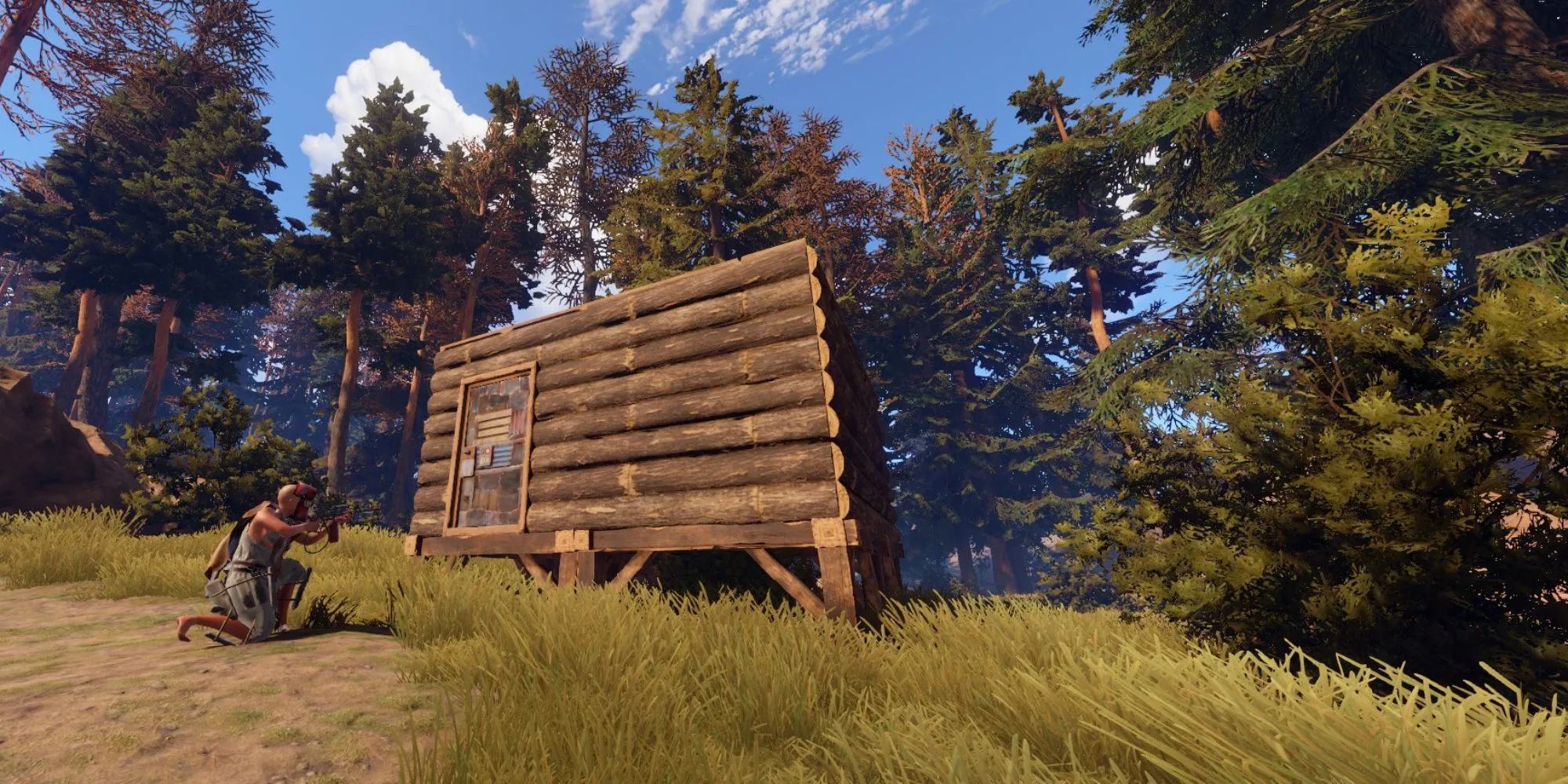 Người chơi Rust quan sát từ xa bên ngoài căn cứ trong game sinh tồn thế giới mở