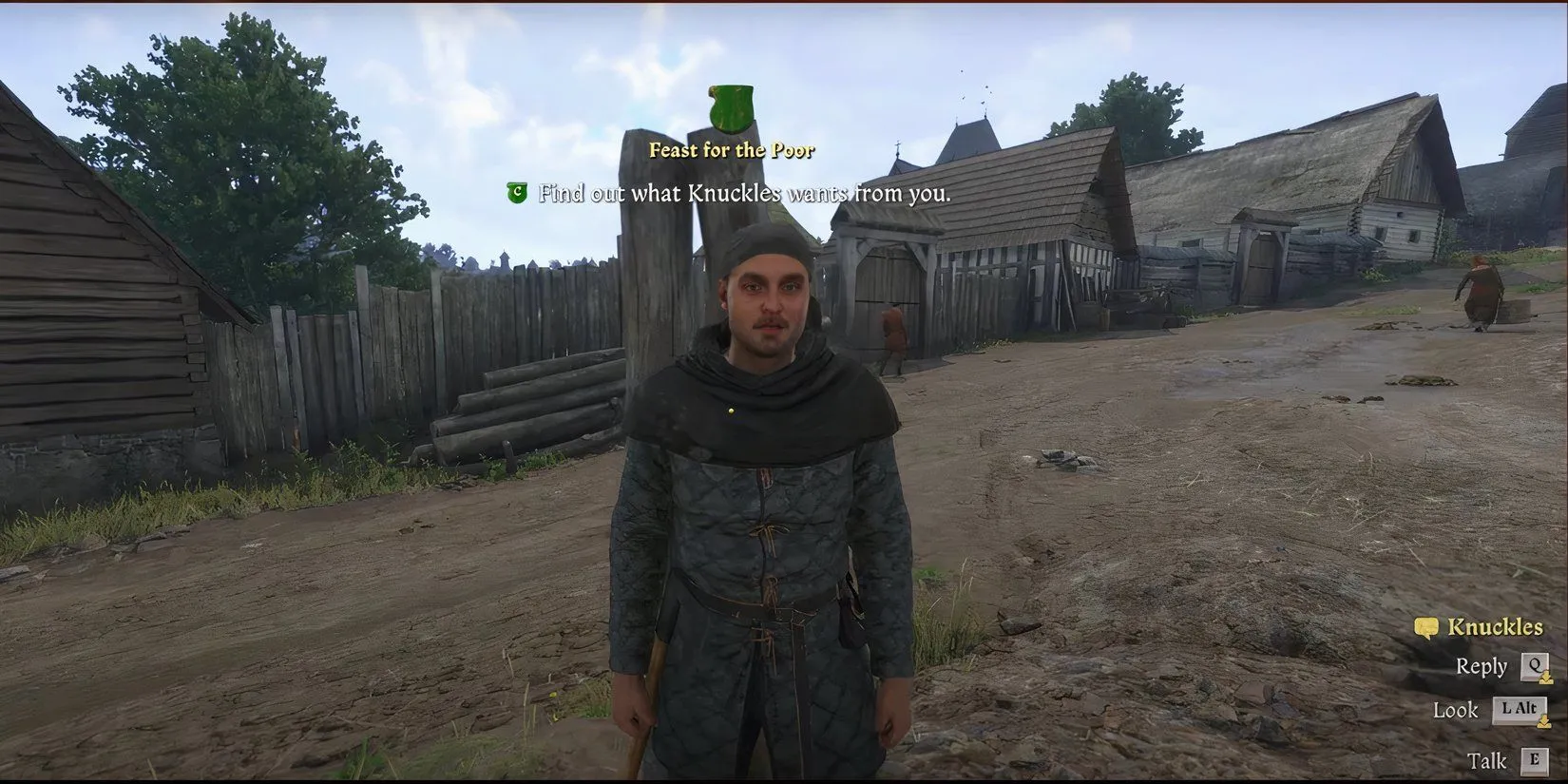 Nhân vật Knuckles đứng bên ngoài quán rượu trong Kingdom Come Deliverance 2 giao nhiệm vụ phụ