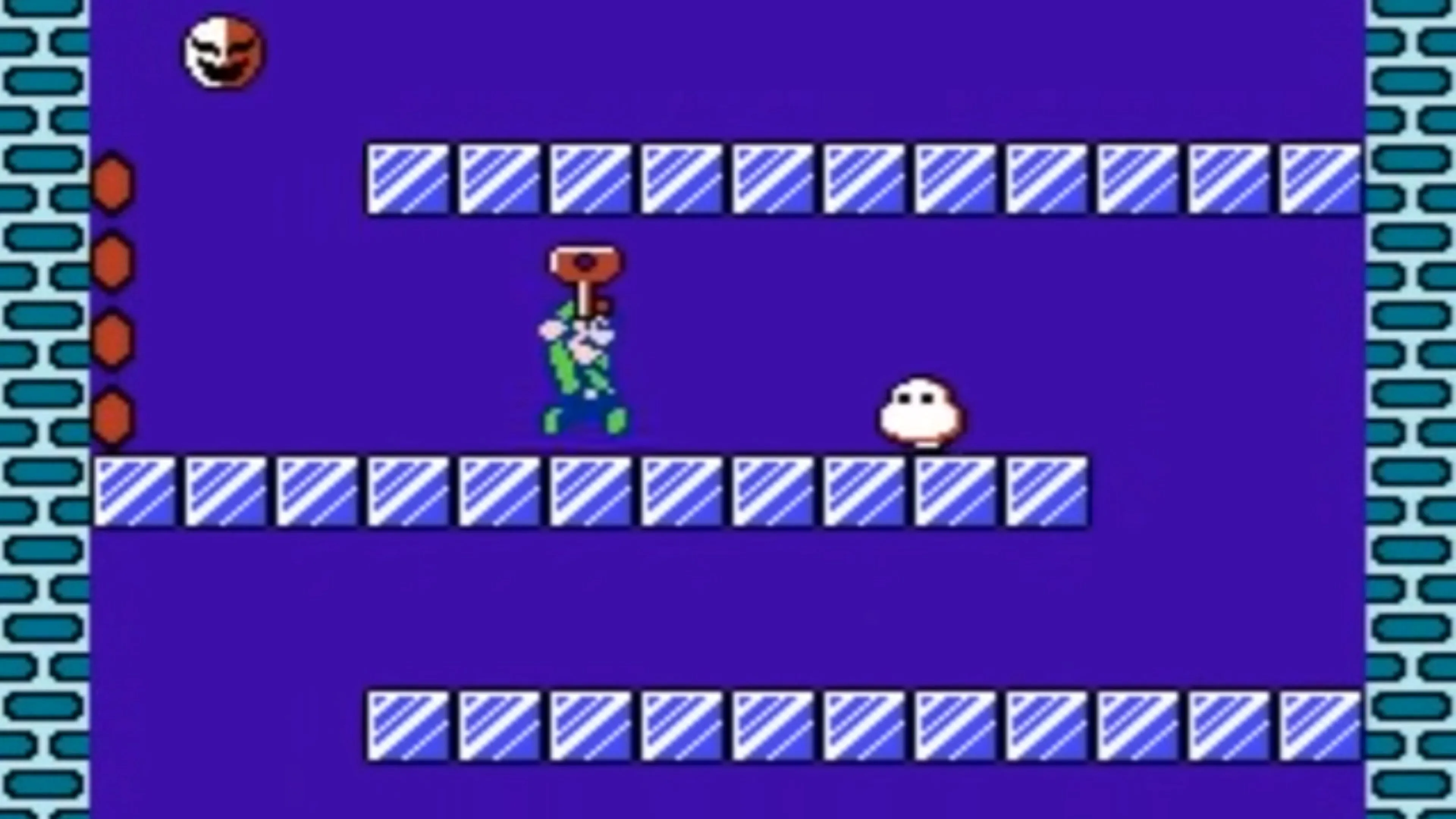 Nhân vật Mario trong Super Mario Bros 2 đang giữ một chiếc chìa khóa lớn trong màn chơi platform