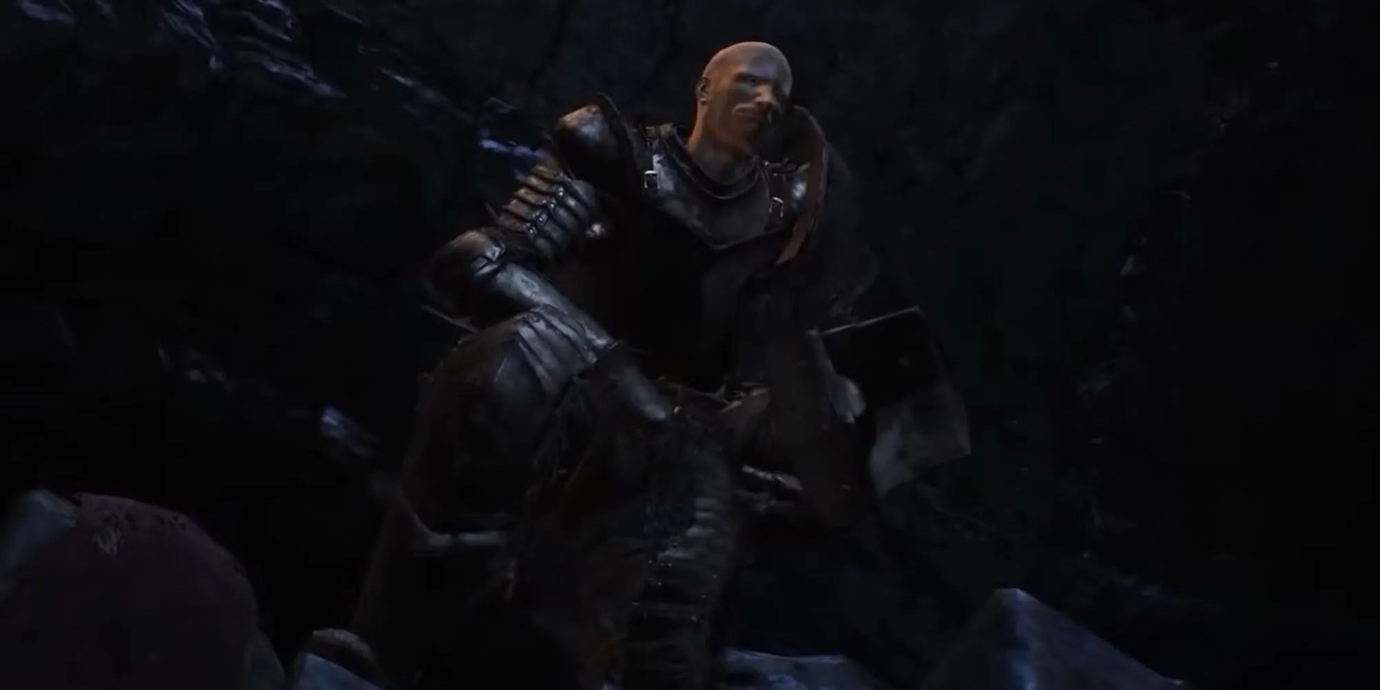 Patches, thương nhân gian xảo từ Dark Souls 3, đang đứng trong cửa hàng của mình