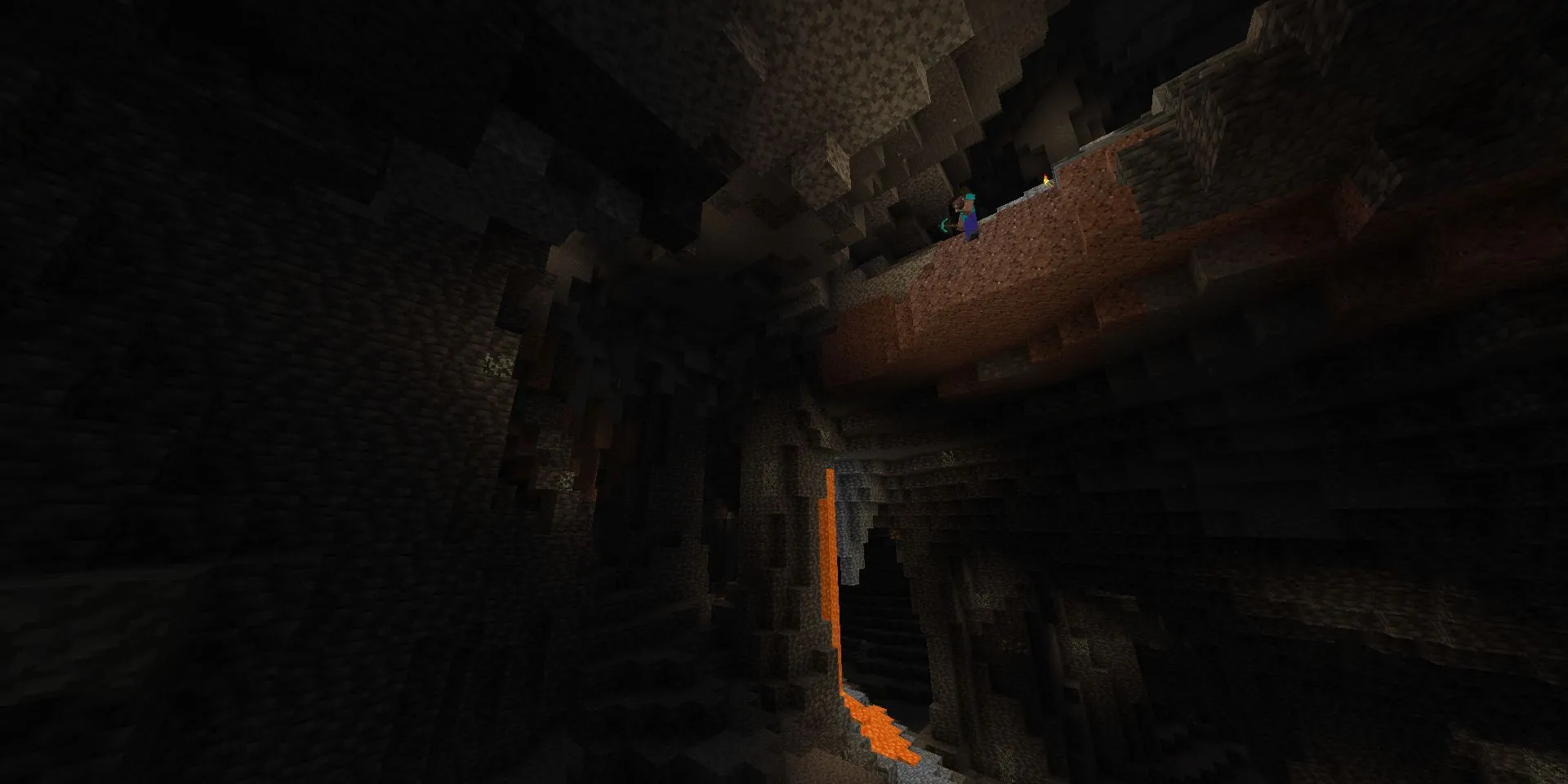 Steve bám rìa vực nhìn xuống hang động khổng lồ trong Minecraft, minh họa độ sâu và quy mô của hệ thống hang mới
