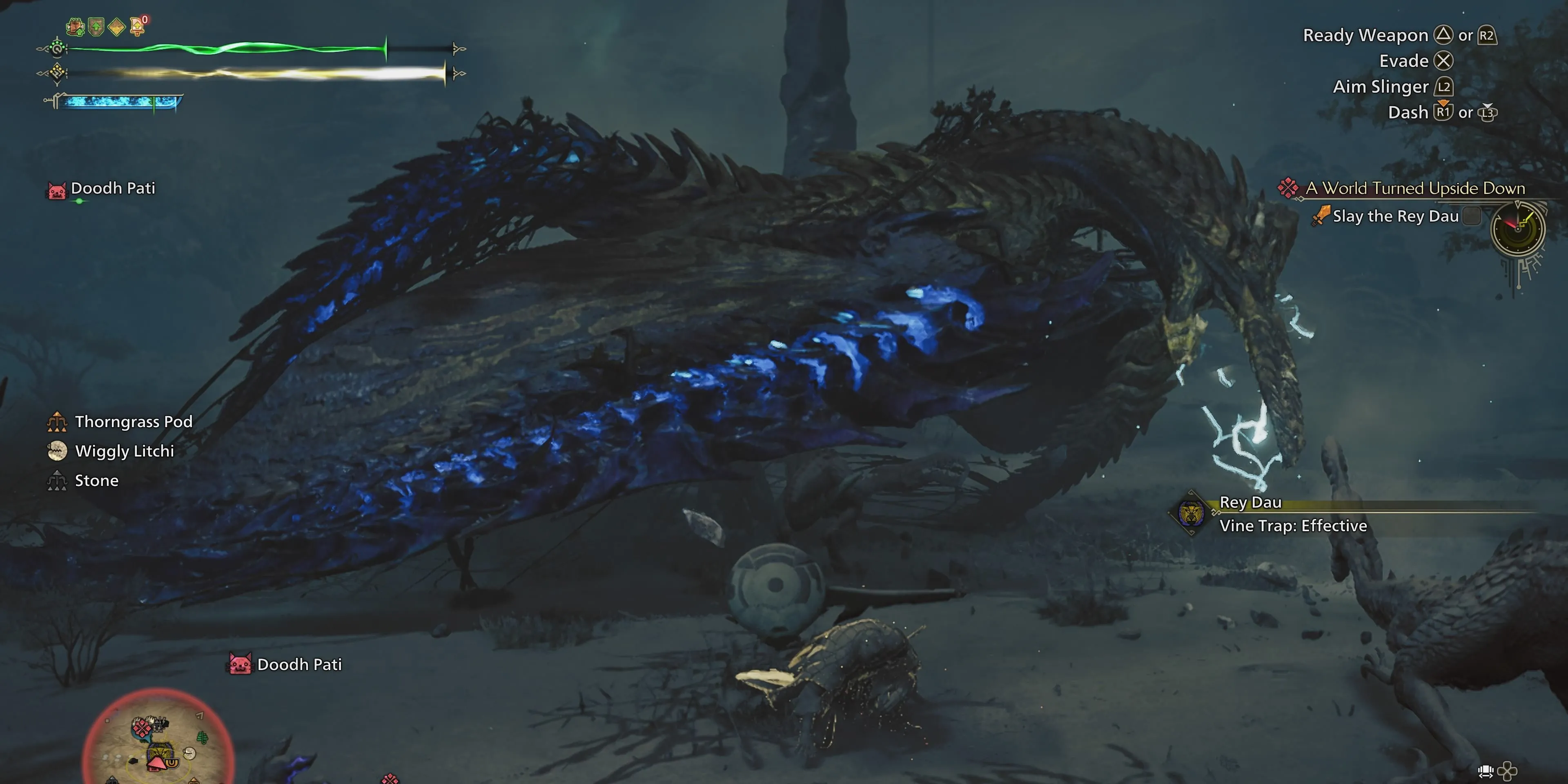 Thợ săn sử dụng bẫy dây leo chiến thuật trên quái vật Rey Dau trong Monster Hunter Wilds