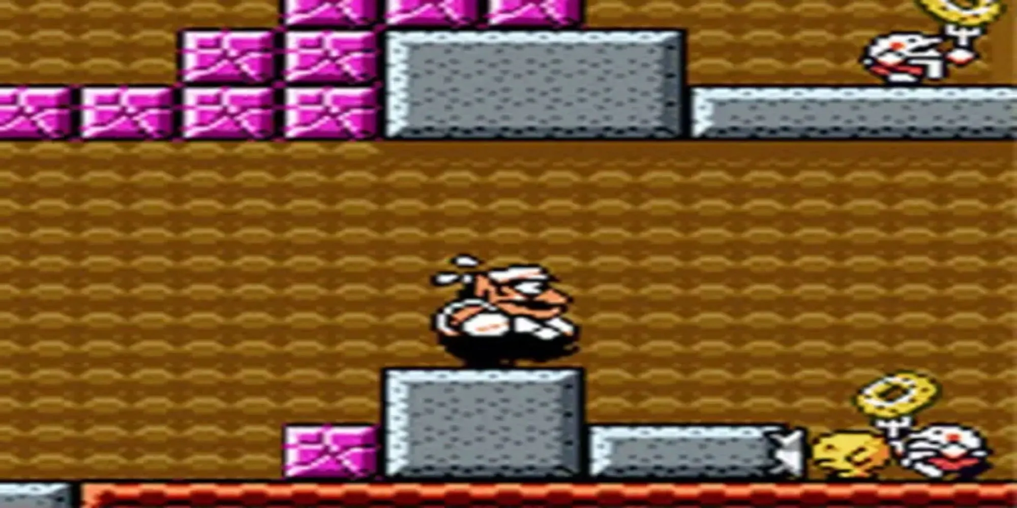 Wario trong game Wario Land 3 trên Game Boy Color đang biến hình sau khi bị tấn công