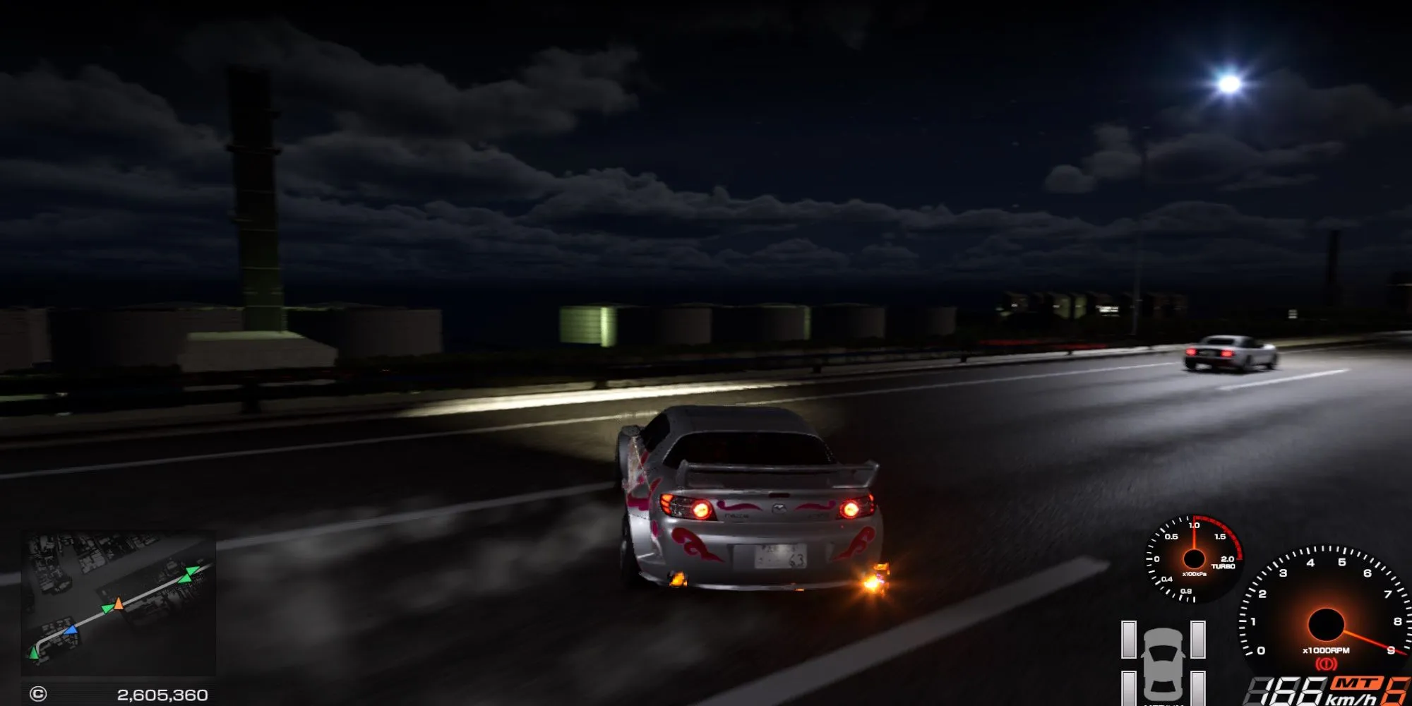 Xe thể thao đang drift trên đường phố Tokyo vào ban đêm trong Tokyo Xtreme Racer