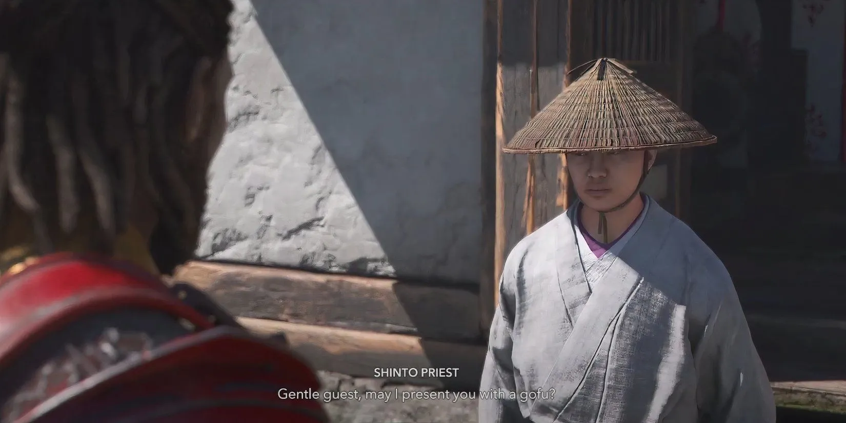 Yasuke nhận Gofu từ Thầy tế Shinto khi thực hiện nghi lễ thanh tẩy cho Phu nhân Oichi