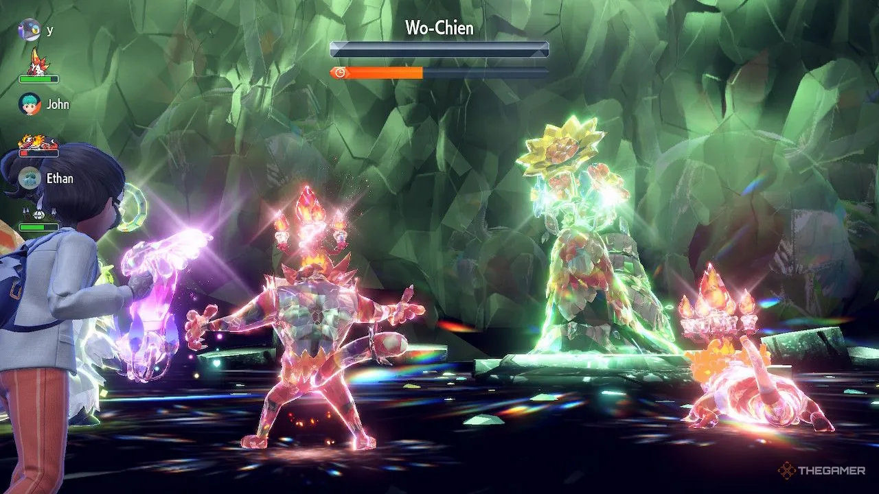 Alt text: Incineroar và đồng đội đánh bại Shiny Wo-Chien trong một trận chiến Tera Raid ở Pokémon Scarlet and Violet.