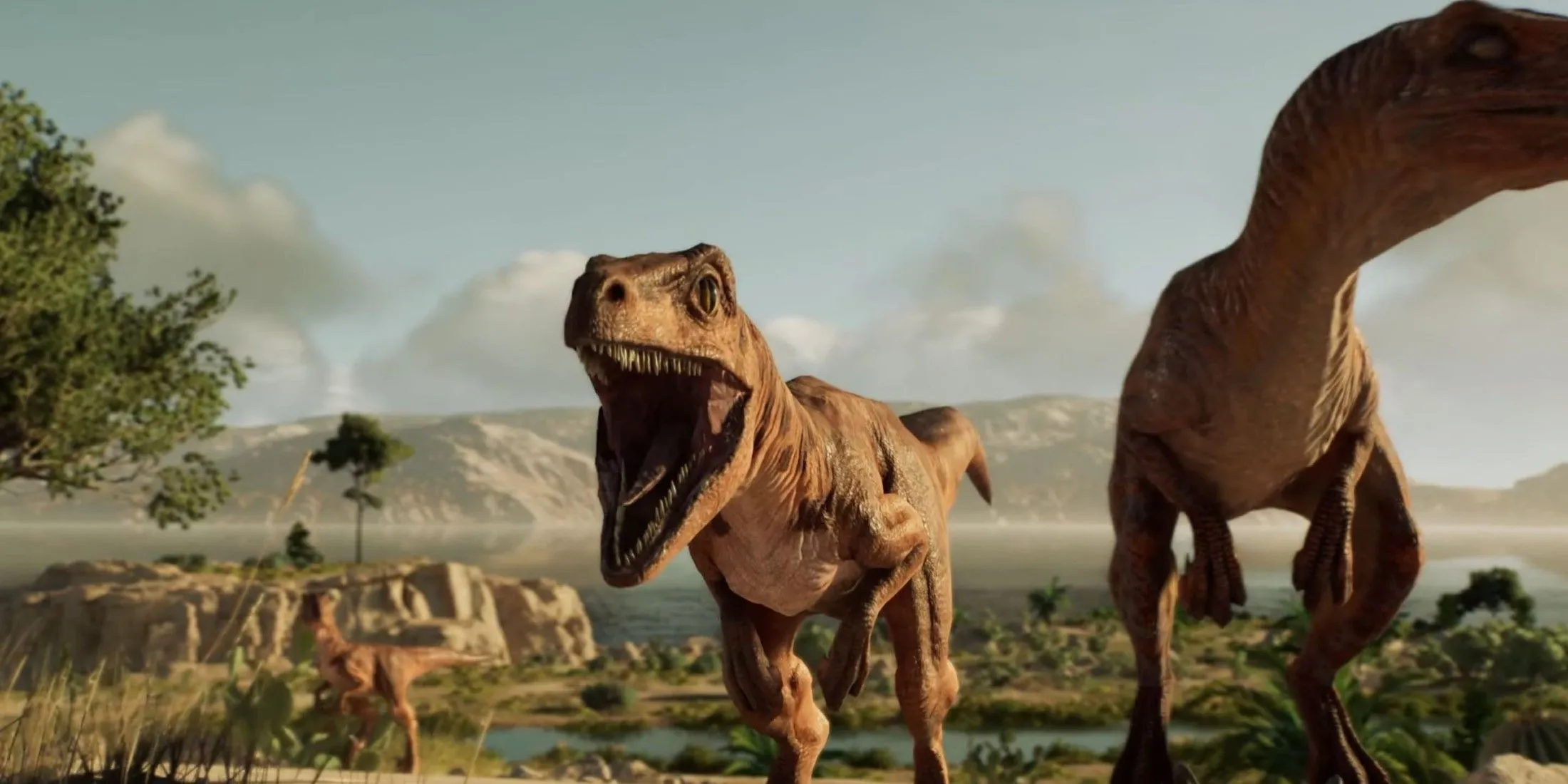 Hai chú Velociraptor trong tựa game mô phỏng Jurassic World Evolution 3