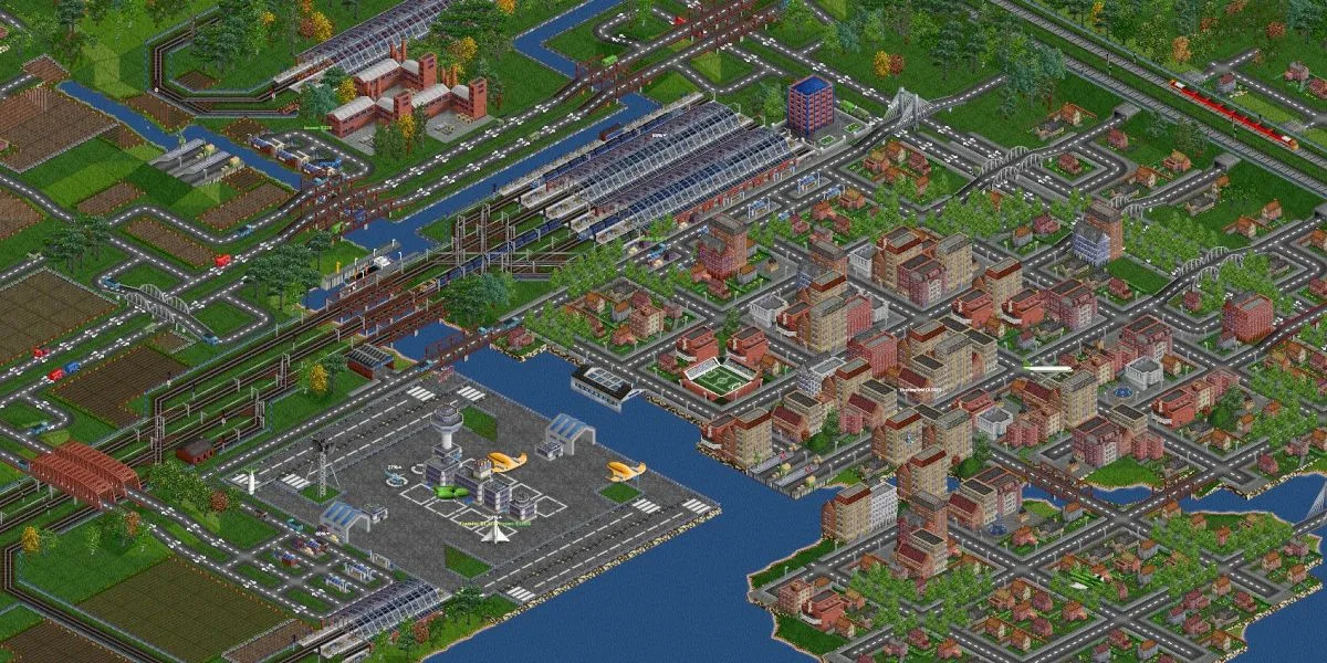 Một thành phố sầm uất với mạng lưới giao thông phức tạp trong OpenTTD, game quản lý kinh doanh miễn phí.