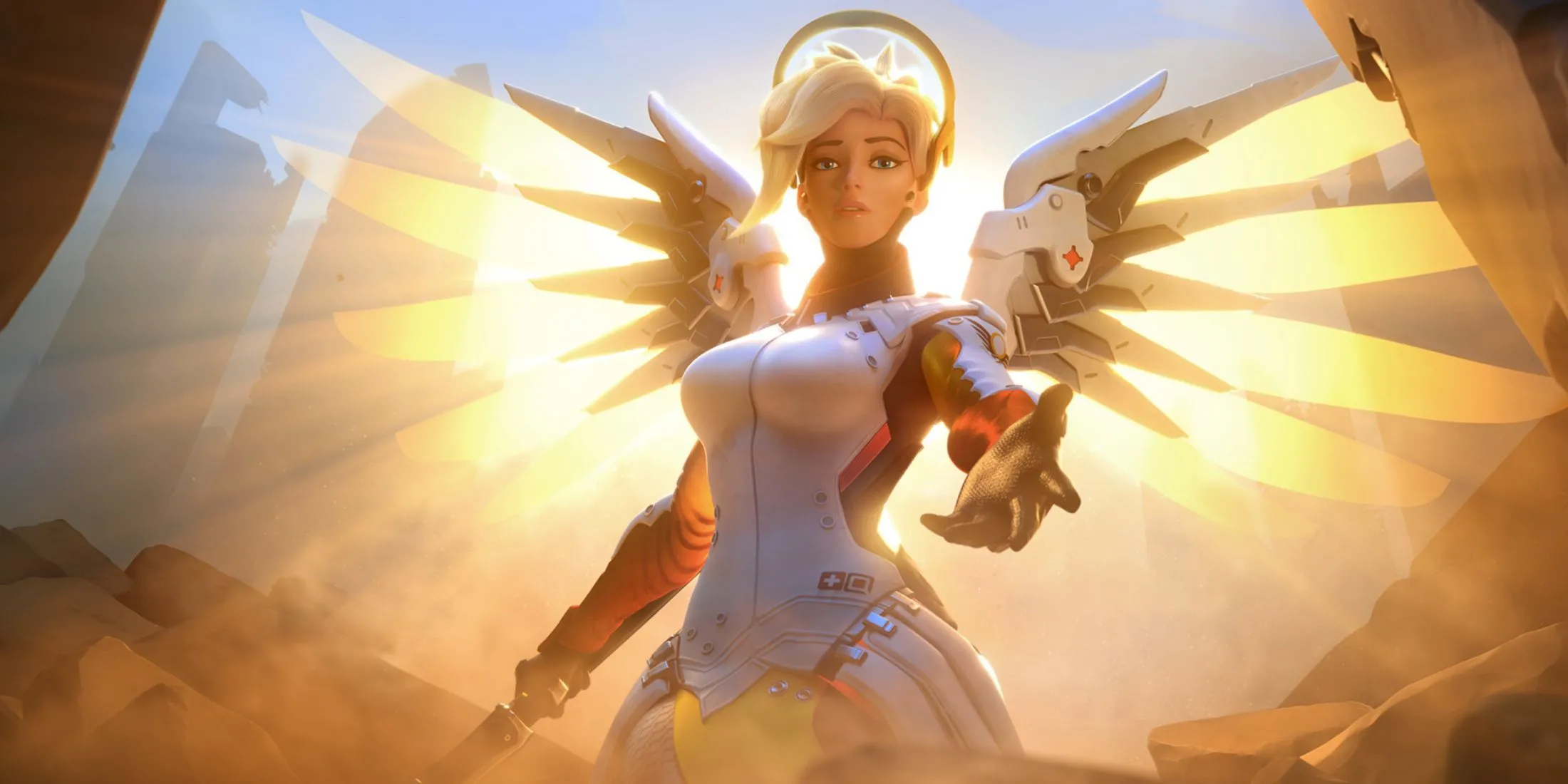 Nữ anh hùng Mercy trong Overwatch 2 đang sử dụng gậy Caduceus để hồi máu hoặc tăng sát thương cho đồng đội, thể hiện khả năng hỗ trợ đắc lực của cô trong chiến đấu.